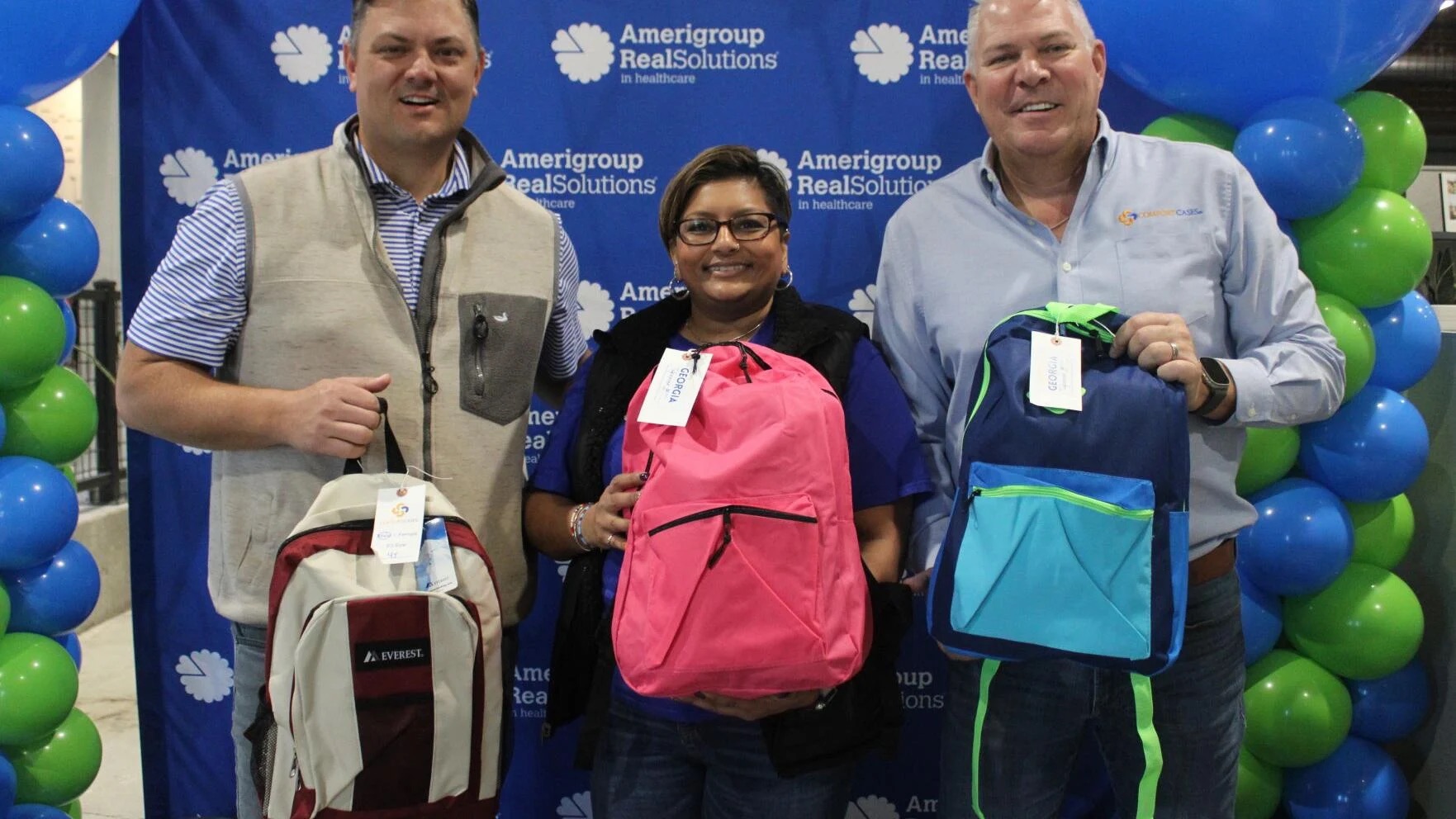 From left to right: Goshen Valley Foundations CEO Zach Blend hosted Bhavini Solanki, director of foster care for Amerigroup Georgia and Comfort Cases Founder Rob Scheer Monday to help distribute 500 backpacks filled with essential items to local and out of county foster care organizations for foster kids.