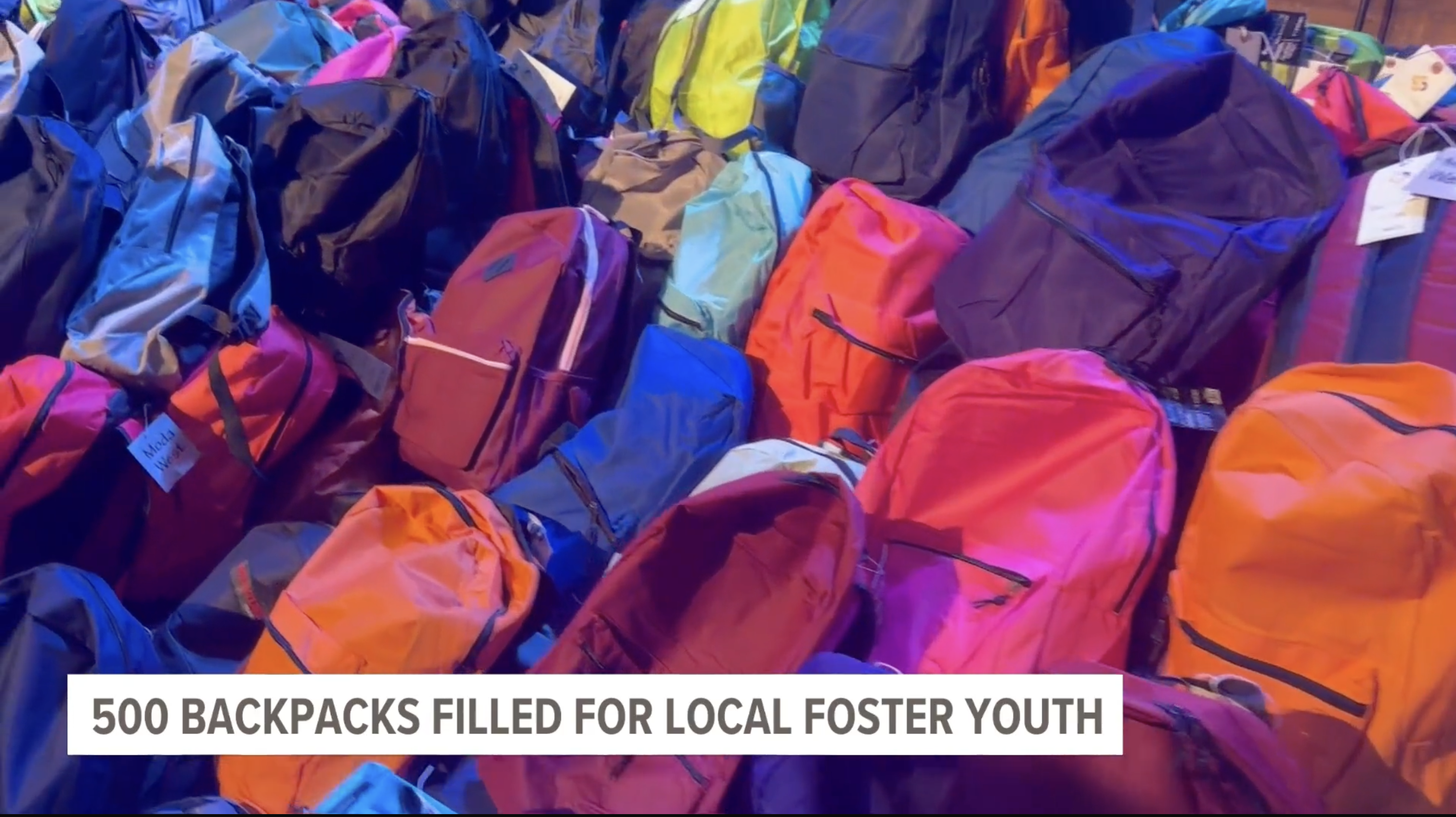 500 Backpacks Filled For Local Youth in Foster Care with Comfort Cases